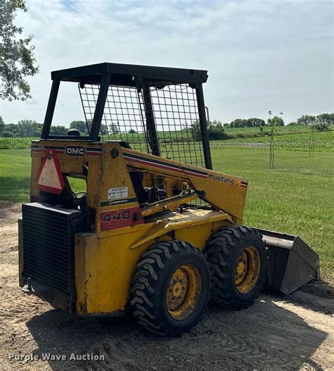 older model mustang skid steer attachments|mustang 440 skid steer value.